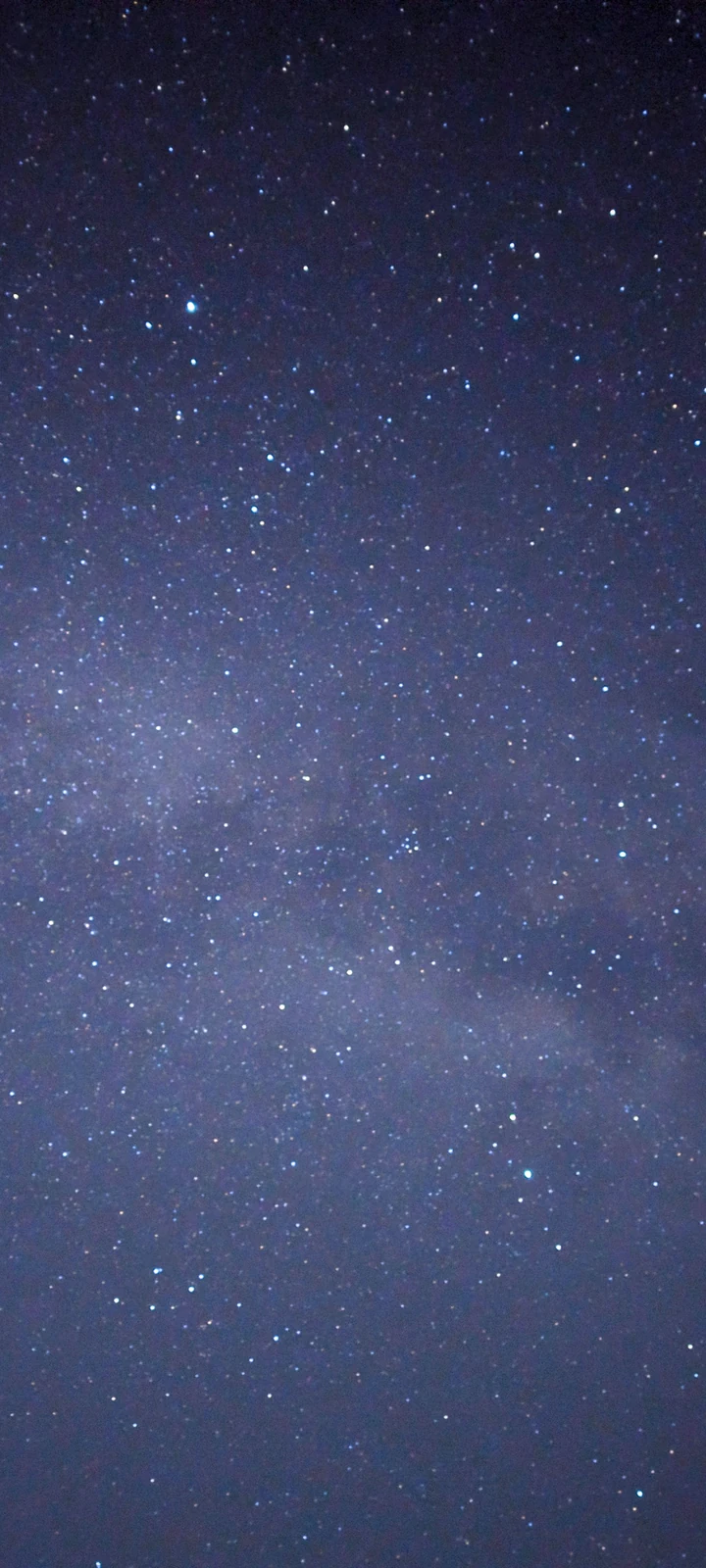 Dense stars and the bright Milky Way core in a natural blue-violet sky